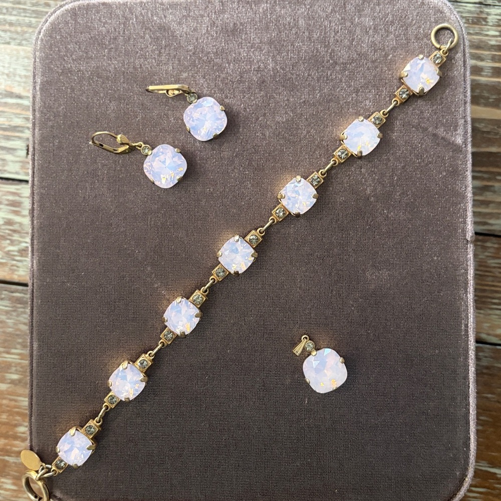 Catherine Popesco Gold and Opalescent Earrings, bracelet, and pendant set.